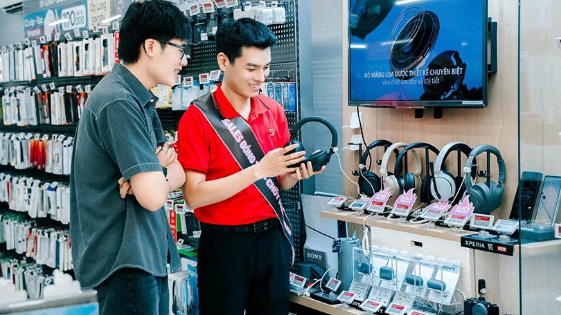 Minh họa cửa hàng điện tử, nhấn mạnh địa điểm mua tai nghe không dây chính hãng.