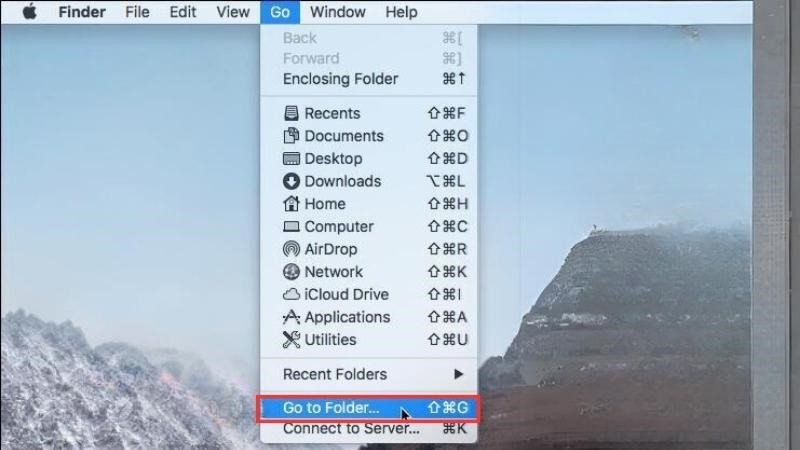Mở Finder và chọn Go to Folder để truy cập file cấu hình Bluetooth trên MacBook