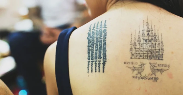 Bùa Thái 5 Dòng: Bí Ẩn, Công Dụng và Cách Sử Dụng Chuẩn 2026 Hình ảnh bùa thái 5 dòng được xăm trên lưng